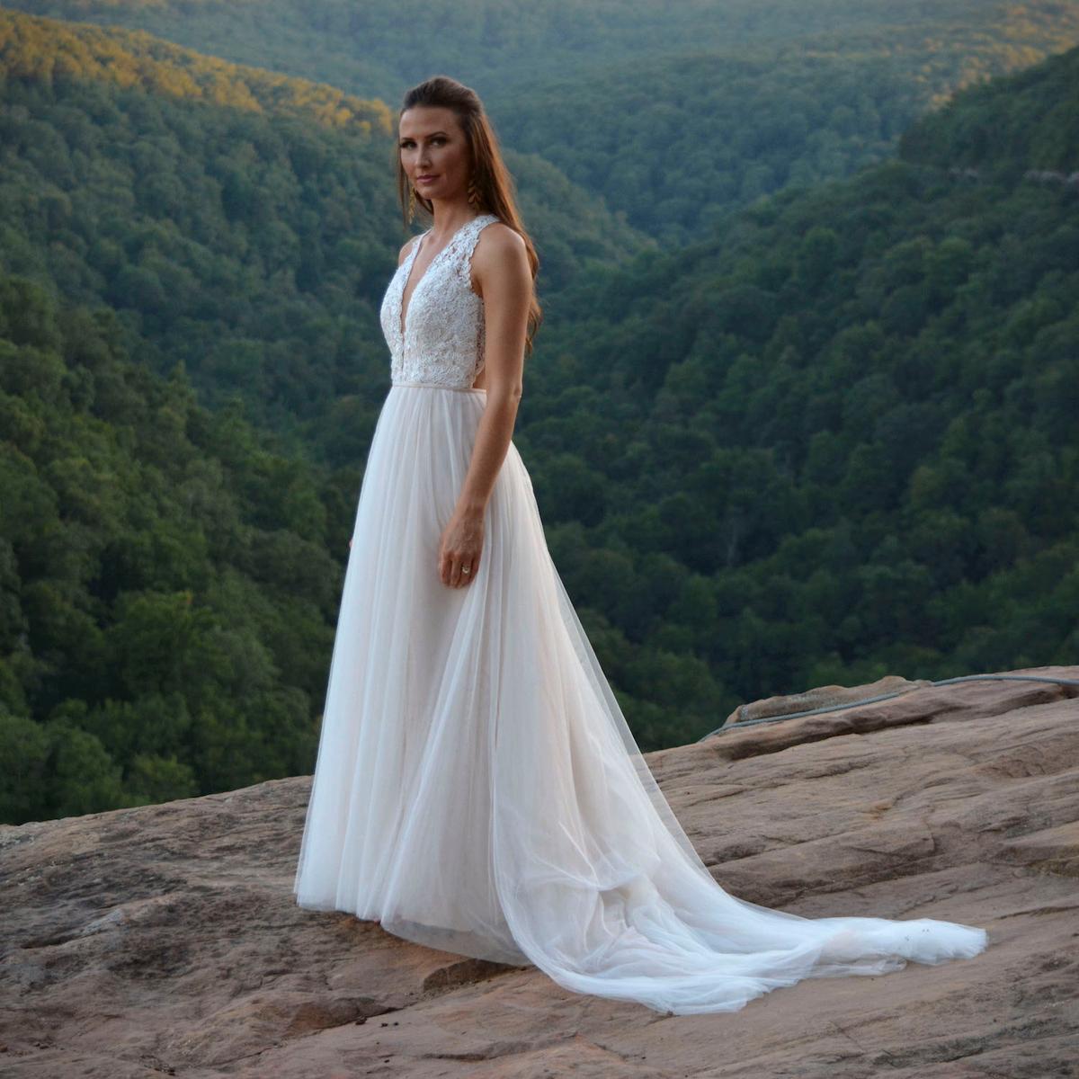 Skye Myers donned a beautiful full-length wedding gown. (Caters News)