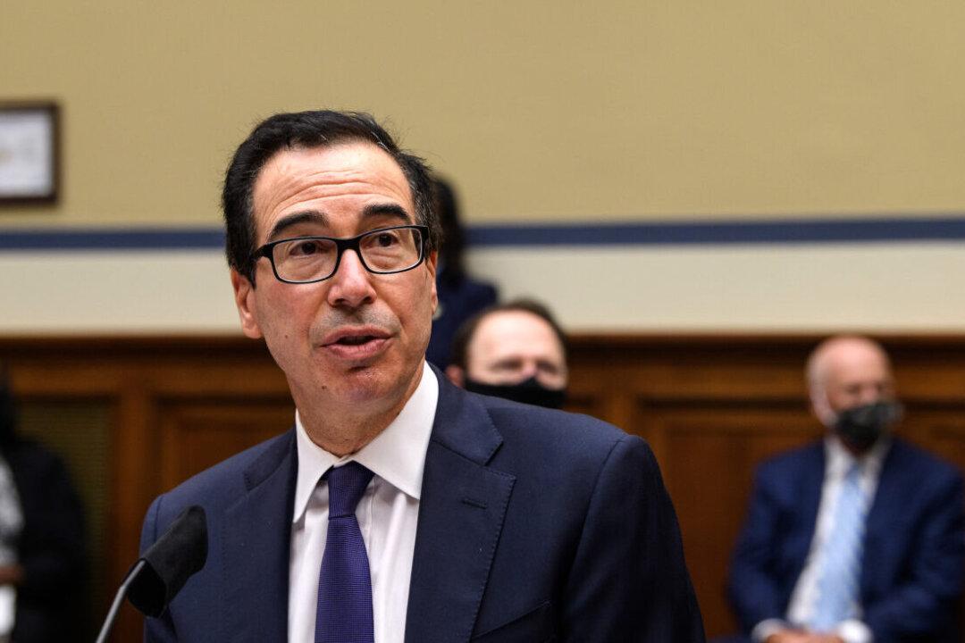 SoftBank Backs Steven Mnuchin’s $2.5 Billion Private Equity Fund