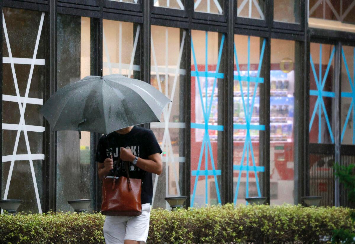 The windows of a hotel are seen taped in the preparation for approaching typhoon in Kagoshima city, southwestern Japan, on Sept. 6, 2020. (Takuto Kaneko/Kyodo News via AP)