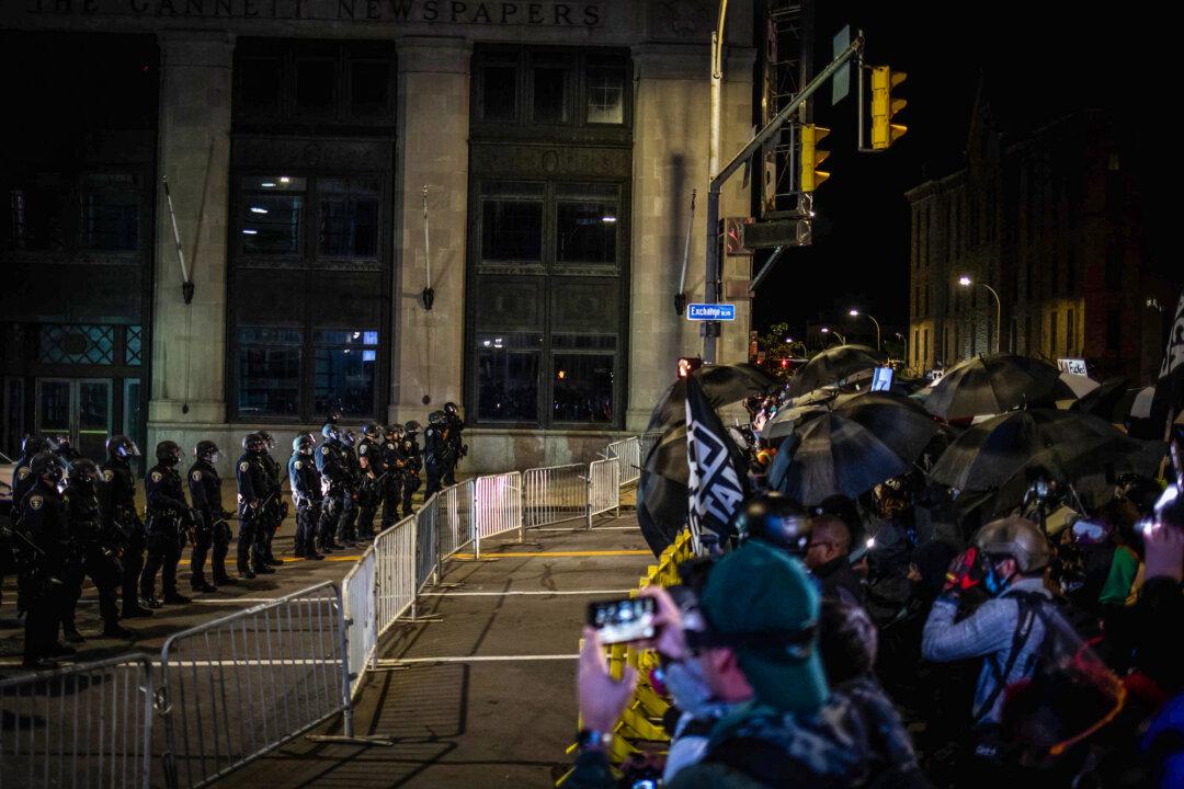 School District Official Placed on Leave Over Video of Him Cursing at Police During BLM Protest