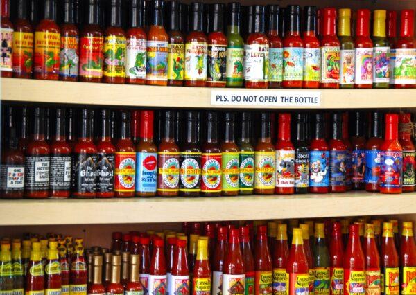 Chile-heads love to sample and collect hot sauces, for the flavor and potency of the specific elixirs as well as for the opportunity to grab a portable pepper fix. (Michael Kaercher/Shutterstock)