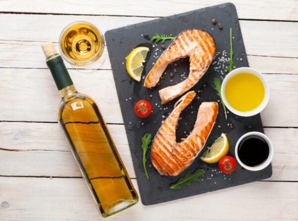 A rich, oily chardonnay works beautifully with salmon, a rich, oily fish. (Evgeny Karandaev/Shutterstock)