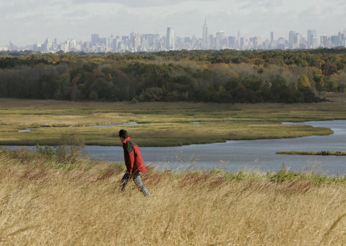 A member of the press gets a tour of what will be New York's new parkland at Fresh Kills landfill in Staten Island New York, Oct. 25, 2006. (TIMOTHY A. CLARY/AFP via Getty Images)