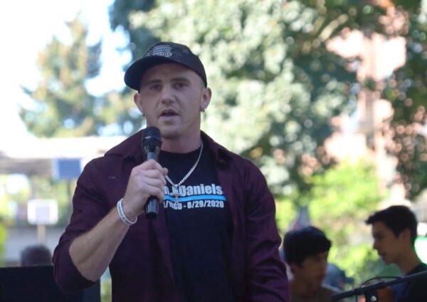 Chandler Pappas, a friend of Portland shooting victim Aaron "Jay" Danielson, speaks at a memorial service at Esther Short Park in Vancouver, Washington, on Sept. 5, 2020. (The Epoch Times)