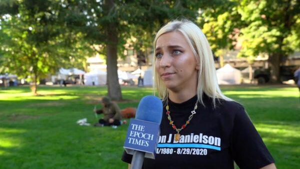 Haley Adams, a friend of Portland shooting victim Aaron "Jay" Danielson, attends a memorial service at Esther Short Park in Vancouver, Washington, on Sept. 5, 2020. (The Epoch Times)