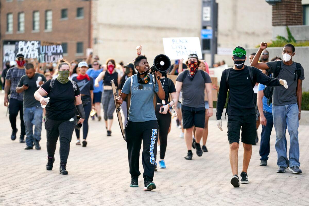 Demonstrators march in Dallas, Texas, on June 6, 2020. (Cooper Neill/Getty Images)