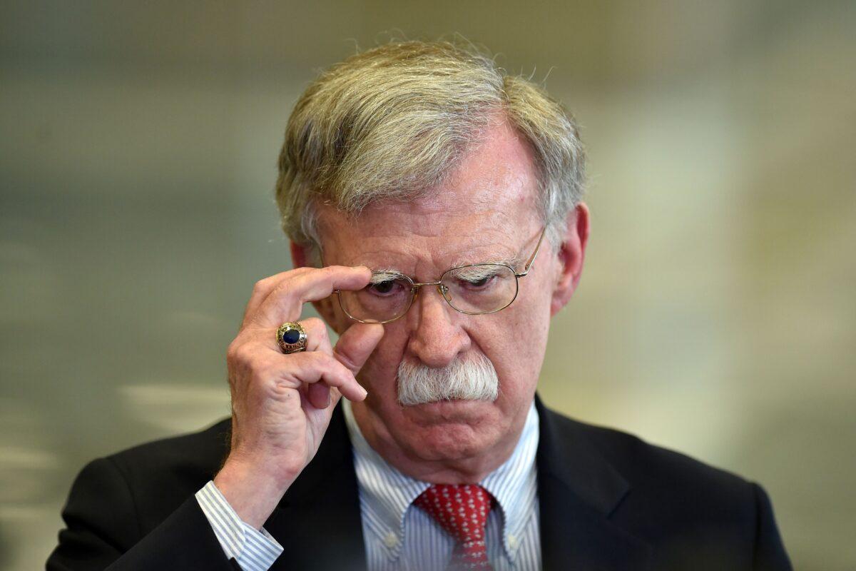 Then-U.S. National Security Advisor John Bolton answers journalists' questions after his meeting with Belarus President in Minsk, on Aug. 29, 2019. (Sergei Gapon/AFP via Getty Images)