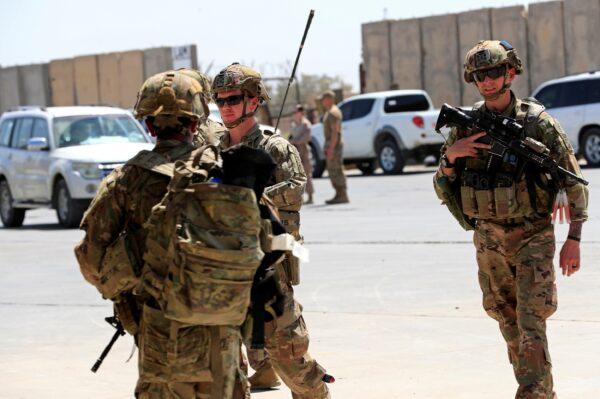 U.S. soldiers during a handover ceremony of the Taji military base from U.S.-led coalition troops to Iraqi security forces on Aug. 23, 2020. (Thaier Al-Sudani/Reuters)