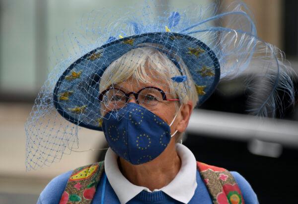 A pro-EU protester is seen at the Westminster Conference Center in London, on Sept. 9, 2020. (Alberto Pezzali / AP Photo)