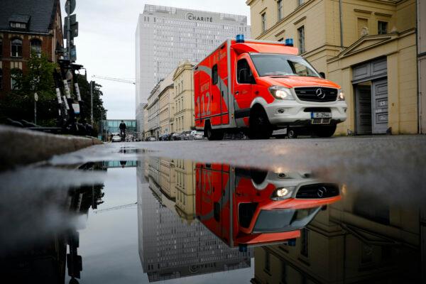 A rescue vehicle drives in front of the central building of the Charite hospital where the Russian opposition leader Alexei Navalny is being treated, in Berlin, on Sept. 2, 2020. (Markus Schreiber/AP Photo)