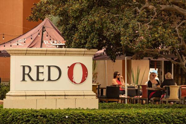 Customers enjoy dining outside at the Red O restaurant in Newport Beach, Calif., on Sept. 9, 2020. (John Fredricks/The Epoch Times)