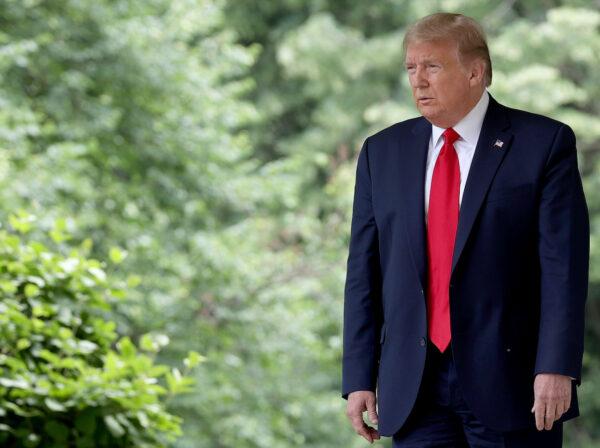 President Donald Trump walks to the Rose Garden to make a statement about U.S. relations with China at the White House in Washington, on May 29, 2020. (Win McNamee/Getty Images)