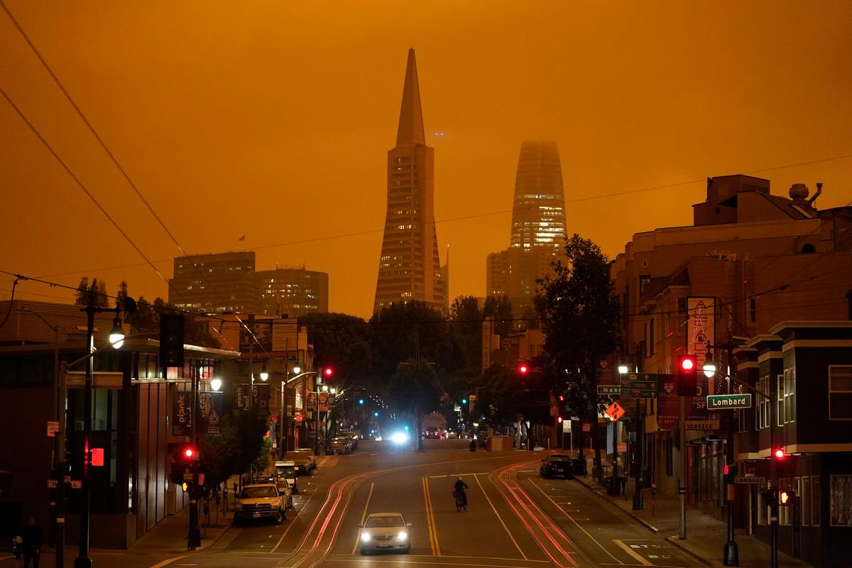 Looking up Columbus Ave. the Transamerica Pyramid and Salesforce Tower are covered with smoke from wildfires late Wednesday morning, Sept. 9, 2020, in San Francisco. (Eric Risberg/AP)