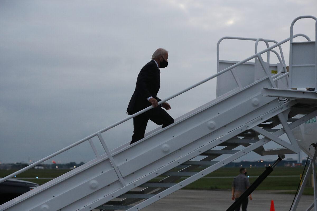 Democratic presidential nominee and former Vice President Joe Biden boards an airplane at New Castle County Airport in Wilmington, Del., on Sept. 11, 2020. (Chip Somodevilla/Getty Images)