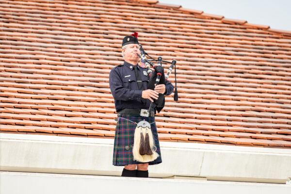 A man plays the bagpipes at the annual 9/11 memorial ceremony at the Richard Nixon Library and Museum in Yorba Linda, Calif., on Sept. 11, 2020. (John Fredricks/The Epoch Times)