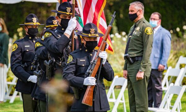 Orange County Sheriff Don Barnes, right, watches as a color guard presents arms at a ceremony commemorating sacrifices made by first responders on 9/11 at the Richard Nixon Library and Museum in Yorba Linda, Calif., on Sept. 11, 2020. (John Fredricks/The Epoch Times)