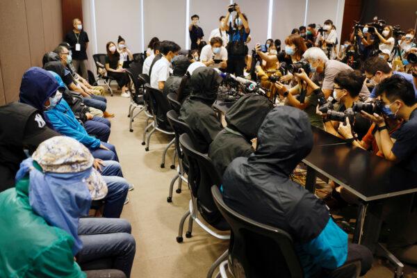 Family members of twelve Hong Kong activists, detained as they reportedly sailed to Taiwan for political asylum, hold a news conference to seek help in Hong Kong, China on Sept. 12, 2020. (Tyrone Siu/Reuters)