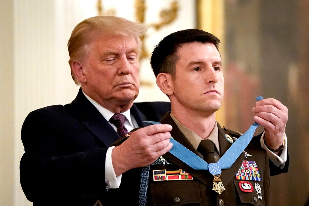  President Donald Trump presents the Medal of Honor to Sergeant Major Thomas P. Payne, United States Army, for conspicuous gallantry in the East Room of the White House in Washington, on Sept. 11, 2020. (Drew Angerer/Getty Images)