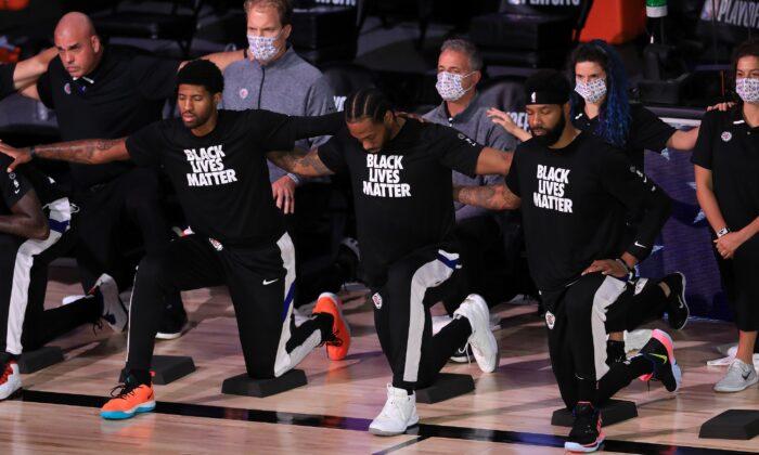 NBA Players Kneel During National Anthem on Anniversary of September 11 Attacks