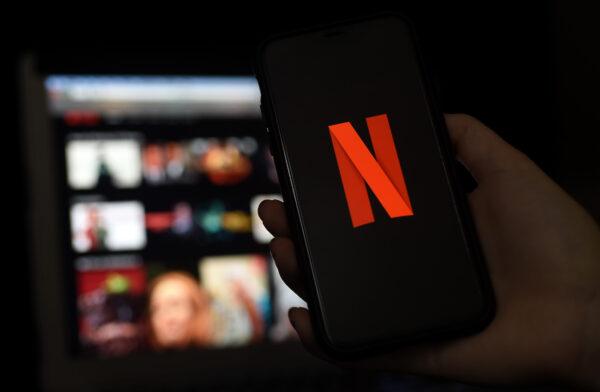 The Netflix logo in a photo illustration. (Olivier Douliery/AFP via Getty Images)