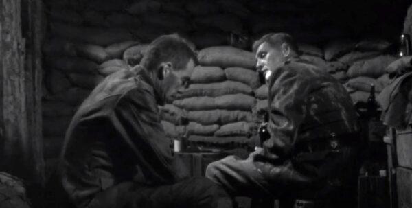 Black and white is used for a scene set in World War I. Lee Marvin (L) and Charles Macaulay in “The Big Red One.” (United Artists)