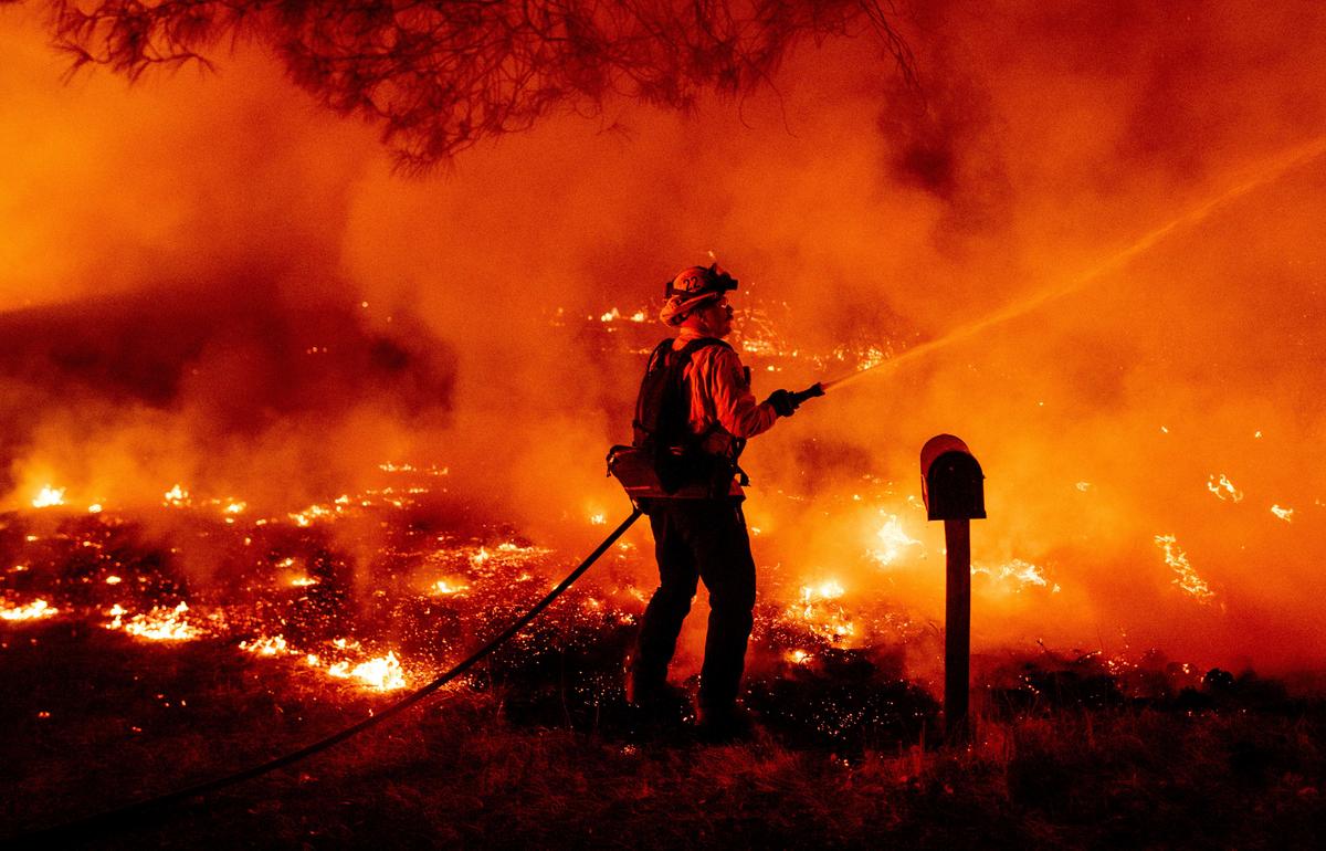 Search on for Survivors as Wildfires Torch Millions of Acres, Trump to Visit California