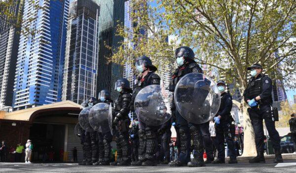  Riot police prepare to deploy against anti-lockdown protesters at Melbourne's Queen Victoria Market during a rally on Sept. 13, 2020. (William West/AFP via Getty Images)