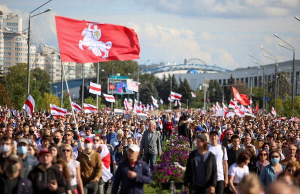 Opposition supporters take part in a rally against police brutality following protests to reject the presidential election results in Minsk, Belarus, on Sept. 13, 2020. (Tut.By/Reuters)