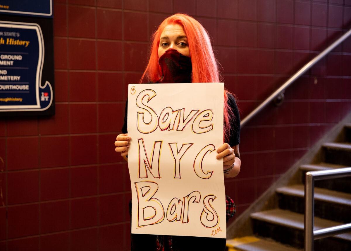 Megan Rickerson, owner of Someday Bar in Brooklyn, takes part in a protest organized by restaurant owners near City Hall in New York City, on Sept. 14, 2020. (Chung I Ho/The Epoch Times)