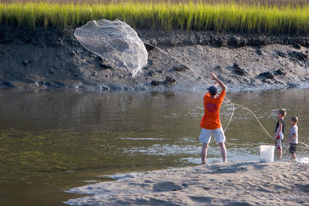 Throwing a cast net at Edisto Beach State Park. (Courtesy of Discover South Carolina)