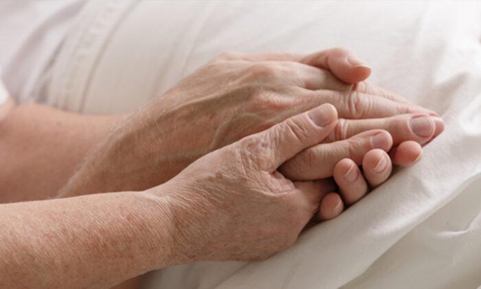 Elderly Couple Dies From COVID-19 Holding Hands, Son Pleads ‘Virus Isn’t a Hoax’