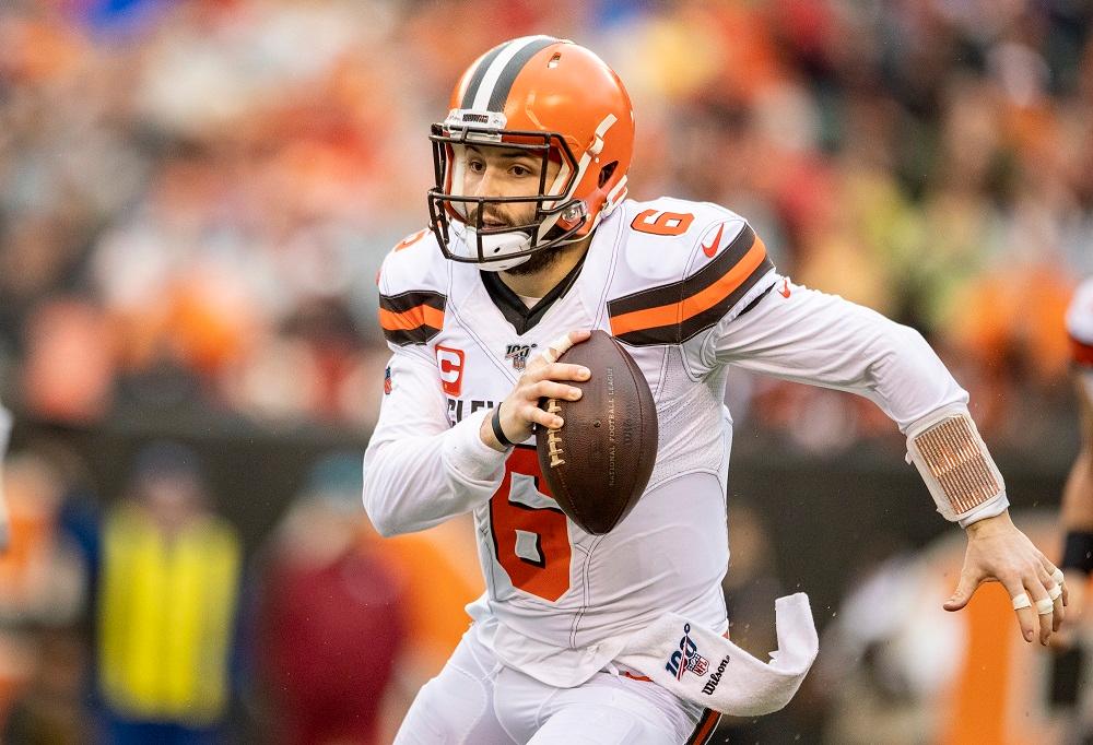 Mayfield runs with the ball in the second quarter of the game against the Cincinnati Bengals at Paul Brown Stadium in Cincinnati, Ohio, on Dec. 29, 2019. (Bobby Ellis/Getty Images)