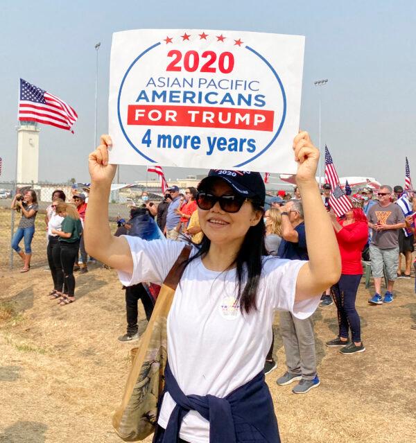Ruth Yu shows support for President Trump at Sacramento McClellan Airport on Sept. 14, 2020, after driving up to Sacramento from Los Angeles the day before. (Nancy Han/The Epoch Times)