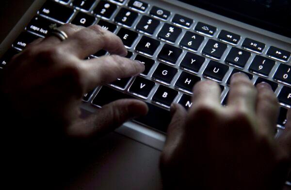 Quebec provincial police say scammers targetted 50 victims, mostly elderly. (Jonathan Hayward/The Canadian Press)