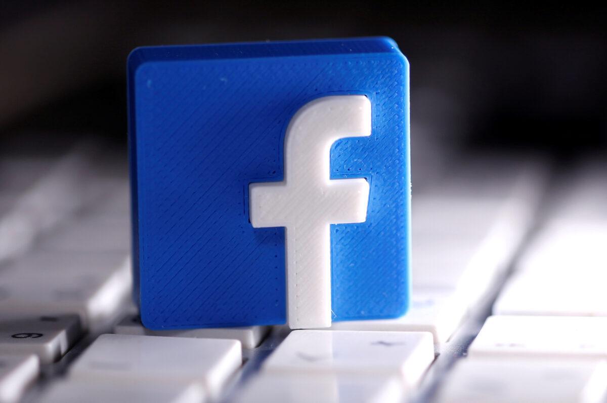 A 3D-printed Facebook logo is seen placed on a keyboard in this illustration taken on March 25, 2020. (Dado Ruvic/Illustration/Global Business Week Ahead/via Reuters)