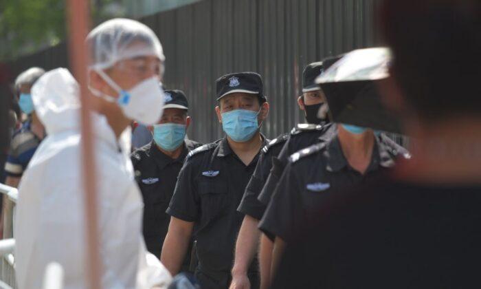 In the Name of Fighting Pandemic, China Strengthens Surveillance State