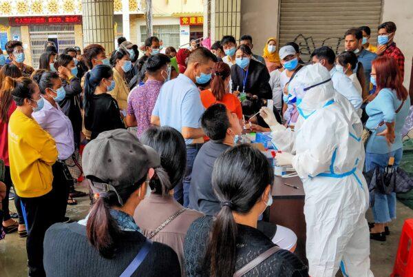 Residents are tested for COVID-19 in Ruili in southwestern China's Yunnan Province on September 15, 2020. (STR/AFP via Getty Images)