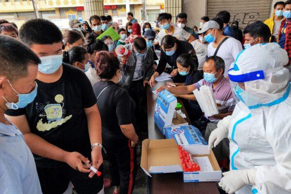 Residents are tested for COVID-19 in Ruili in southwestern China's Yunnan Province on September 15, 2020. (STR/AFP via Getty Images)