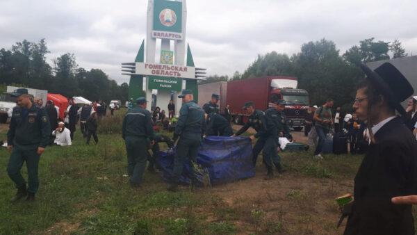 Jewish pilgrims, who plan to enter Ukraine from the territory of Belarus, gather near a border crossing point in Gomel Region, Belarus, on Sept. 15, 2020. (Breslev live/Handout via Reuters)