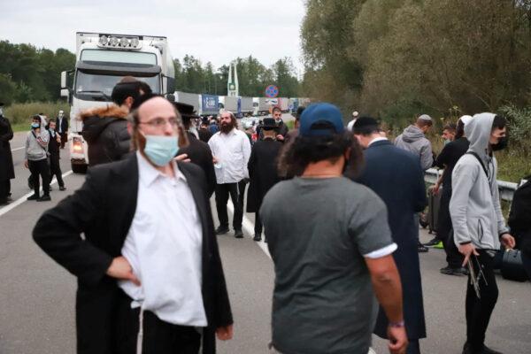 Jewish pilgrims, who plan to enter Ukraine from the territory of Belarus, gather at Novi Yarylovychi crossing point in Chernihiv Region, Ukraine, on Sept. 14, 2020. (State Border Guard Service of Ukraine/Handout via Reuters)
