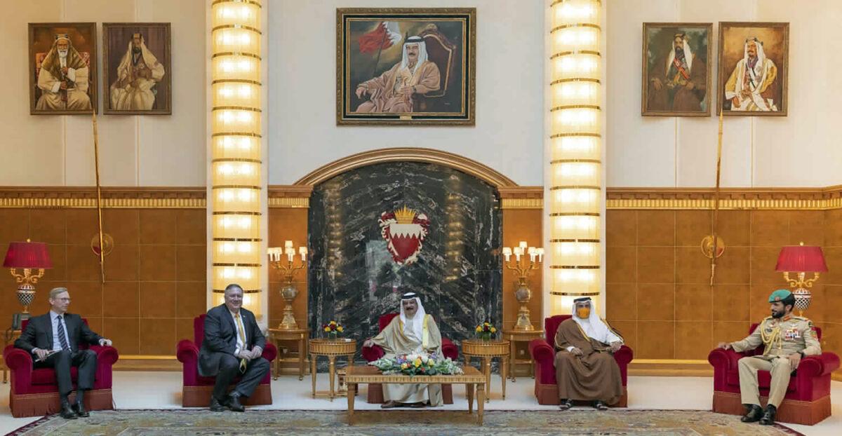 (L-R) U.S. special representative for Iran Brian Hook, U.S. Secretary of State Mike Pompeo, Bahraini King Hamad bin Isa Al Khalifa, Bahraini Crown Prince Salman bin Hamad Al Khalifa and Bahraini national security adviser Nasser bin Hamad Al Khalifa meet at Sakhir Palace in Manama, Bahrain, on Aug. 26, 2020. (Bahrain News Agency via AP)