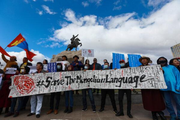Mongolians protest against China's plan to introduce Mandarin-only classes at schools in the Chinese province of Inner Mongolia, at Sukhbaatar Square in Ulaanbaatar, the capital of Mongolia on Sept. 15, 2020. (Byambasuren Byamba-Ochir/AFP via Getty Images)