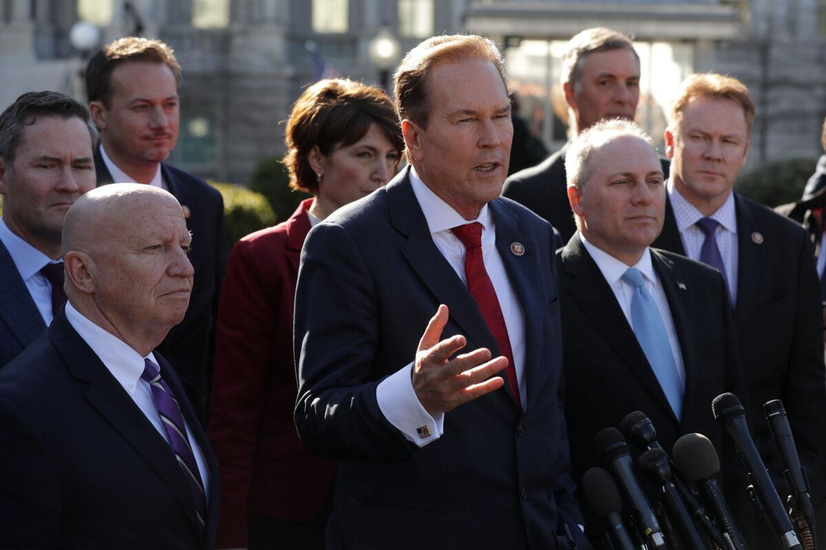 Rep. Vern Buchanan (R-Fla.) (C) is joined by Republican members of the House while talking to reporters outside the White House West Wing in Washington on March 26, 2019. (Chip Somodevilla/Getty Images)