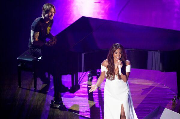 Mickey Guyton (R) and Keith Urban perform "What Are You Gonna Tell Her?" during the 55th annual Academy of Country Music Awards at the Grand Ole Opry House in Nashville, Tenn., on Sept. 16, 2020. (Mark Humphrey/AP Photo)