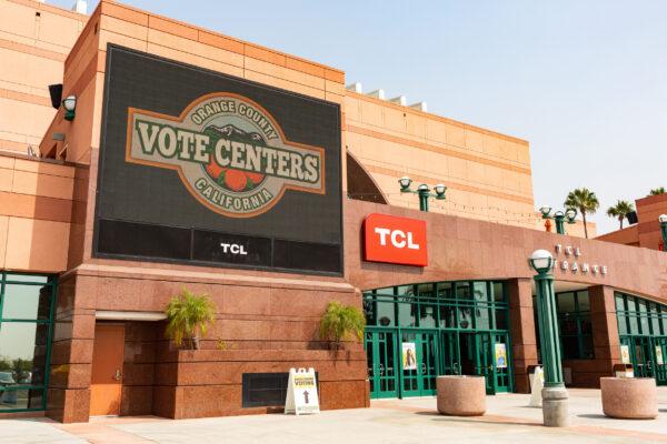 A sign outside the Honda Center announces the arena's temporary transformation into a polling location in Anaheim, Calif., on Sept. 16, 2020. (John Fredricks/The Epoch Times)