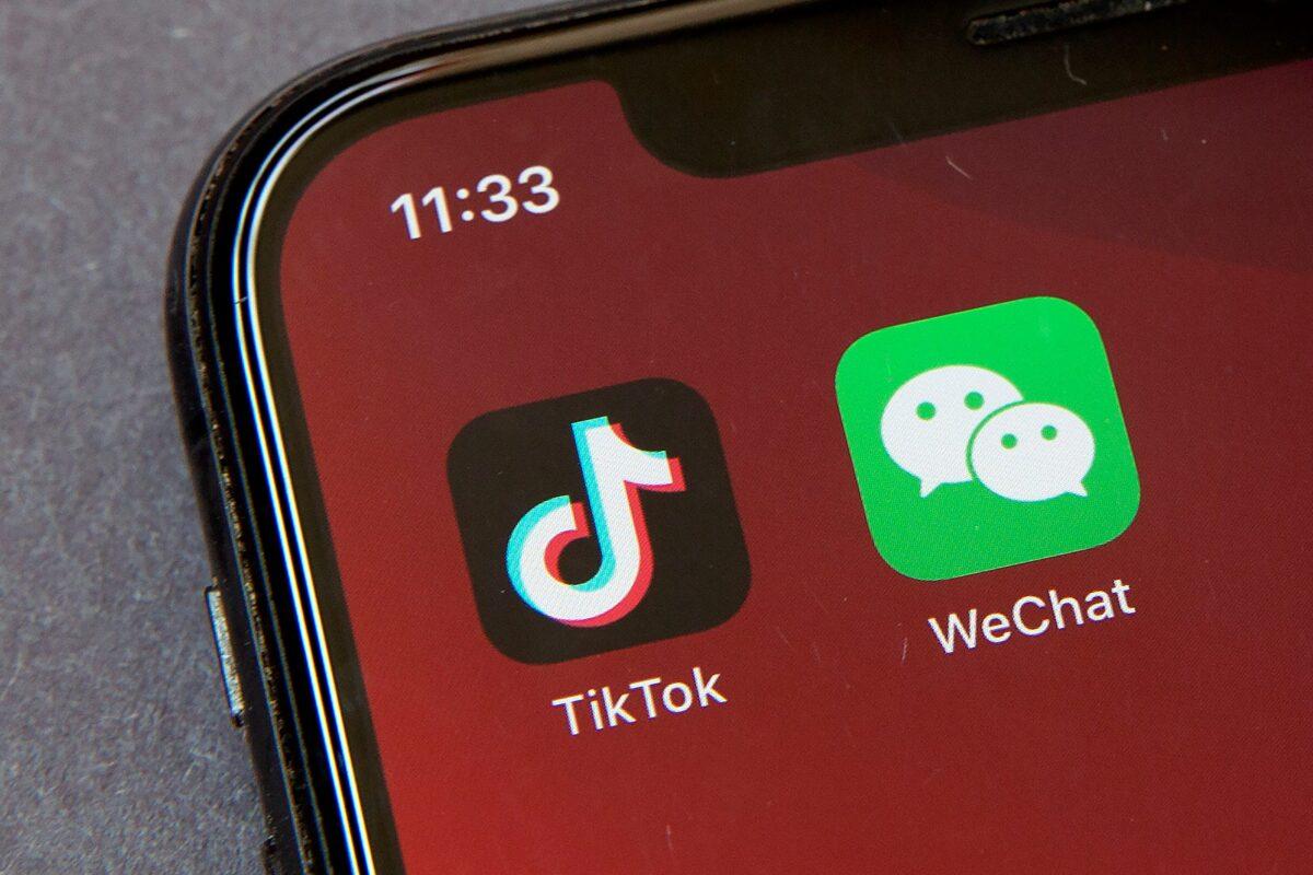 Icons for the smartphone apps TikTok and WeChat are seen on a smartphone screen in Beijing on Aug. 7, 2020. (Mark Schiefelbein/AP Photo)
