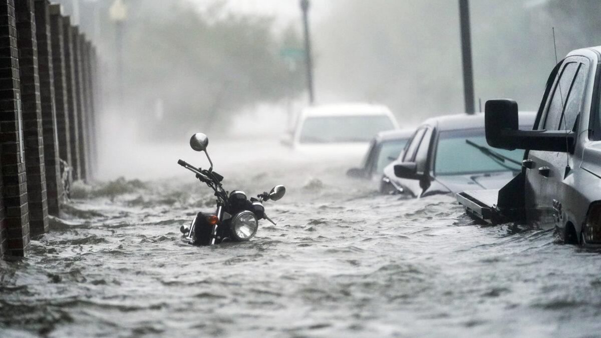 Floodwaters move on the street in Pensacola, Fla., on Sept. 16, 2020. (Gerald Herbert/AP)