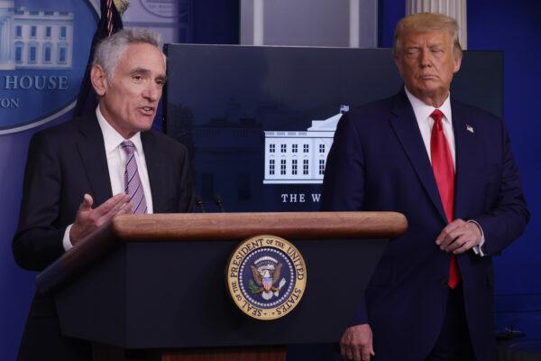 Member of the White House's coronavirus task force Dr. Scott Atlas speaks to the press as President Donald Trump looks on during a news conference at the White House in Washington, on Sept. 16, 2020. (Alex Wong/Getty Images)