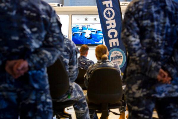 Air Force personnel view a video presentation during the Plan Jericho EDGY AF event for Air Force Innovators at RAAF Base Richmond. (Royal Australian Air Force)