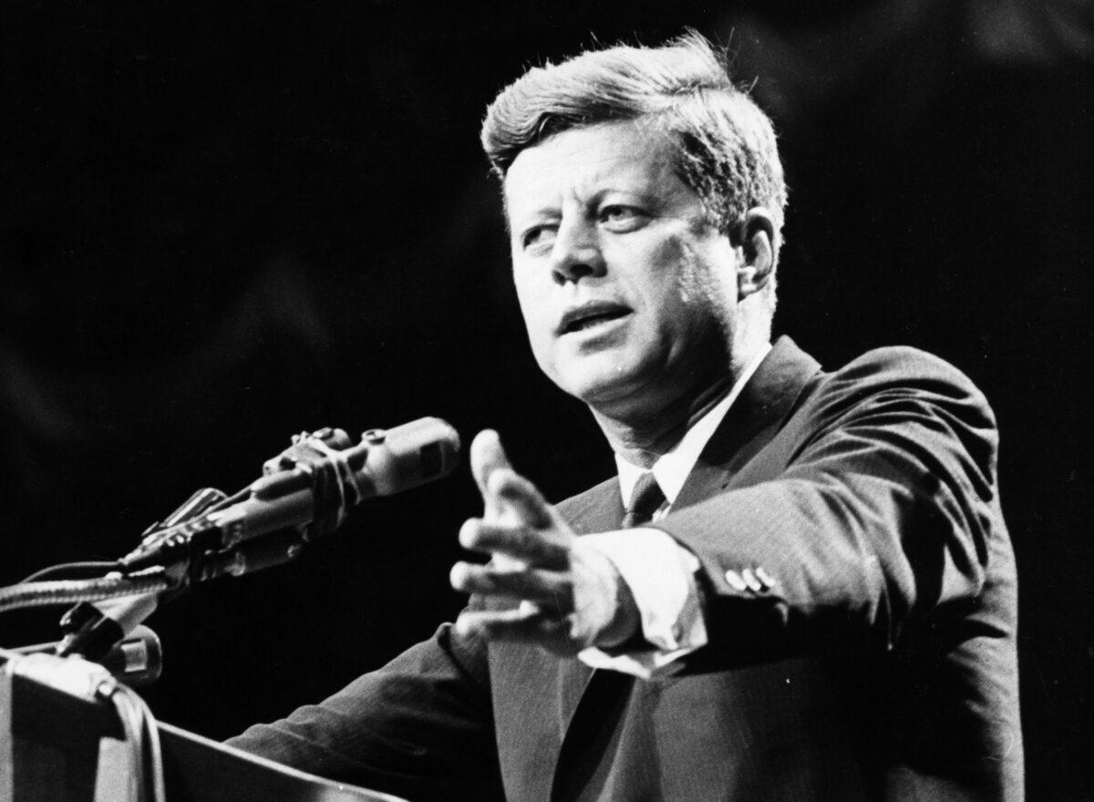 President John F. Kennedy urging citizens to find the right answers, rather than partisan, to America’s problems. (Central Press/Getty Images)